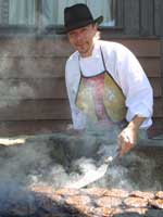 Chef Chris cooks up some tastey Black Angus burgers.