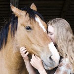 woman hugging horse at Echo Valley Ranch & Spa