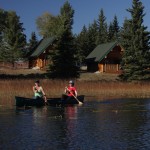 womeen canoeing at free rein guest ranch