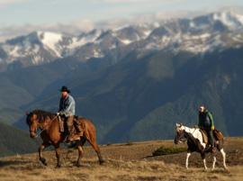 wranglers on horses