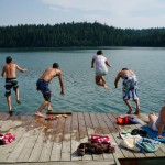 kids diving into water at Spring Lake Ranch